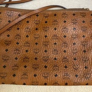 Mcm cross body bag with strap. Good condition